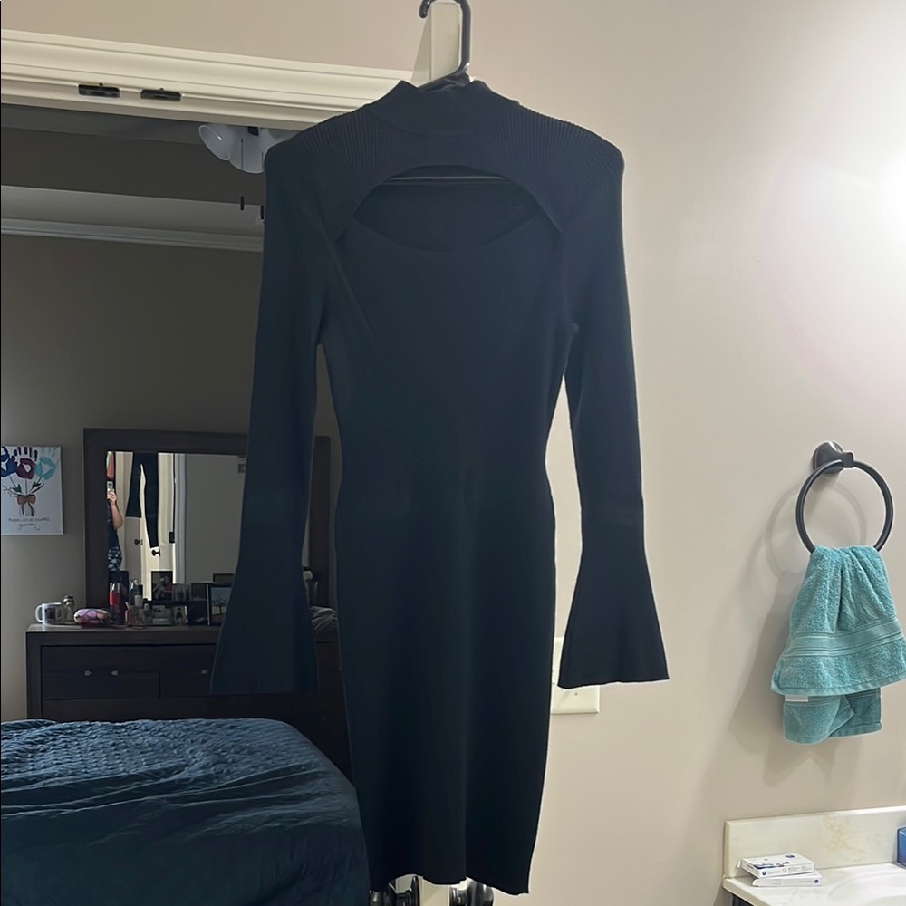 Edgy thin, black sweater dress